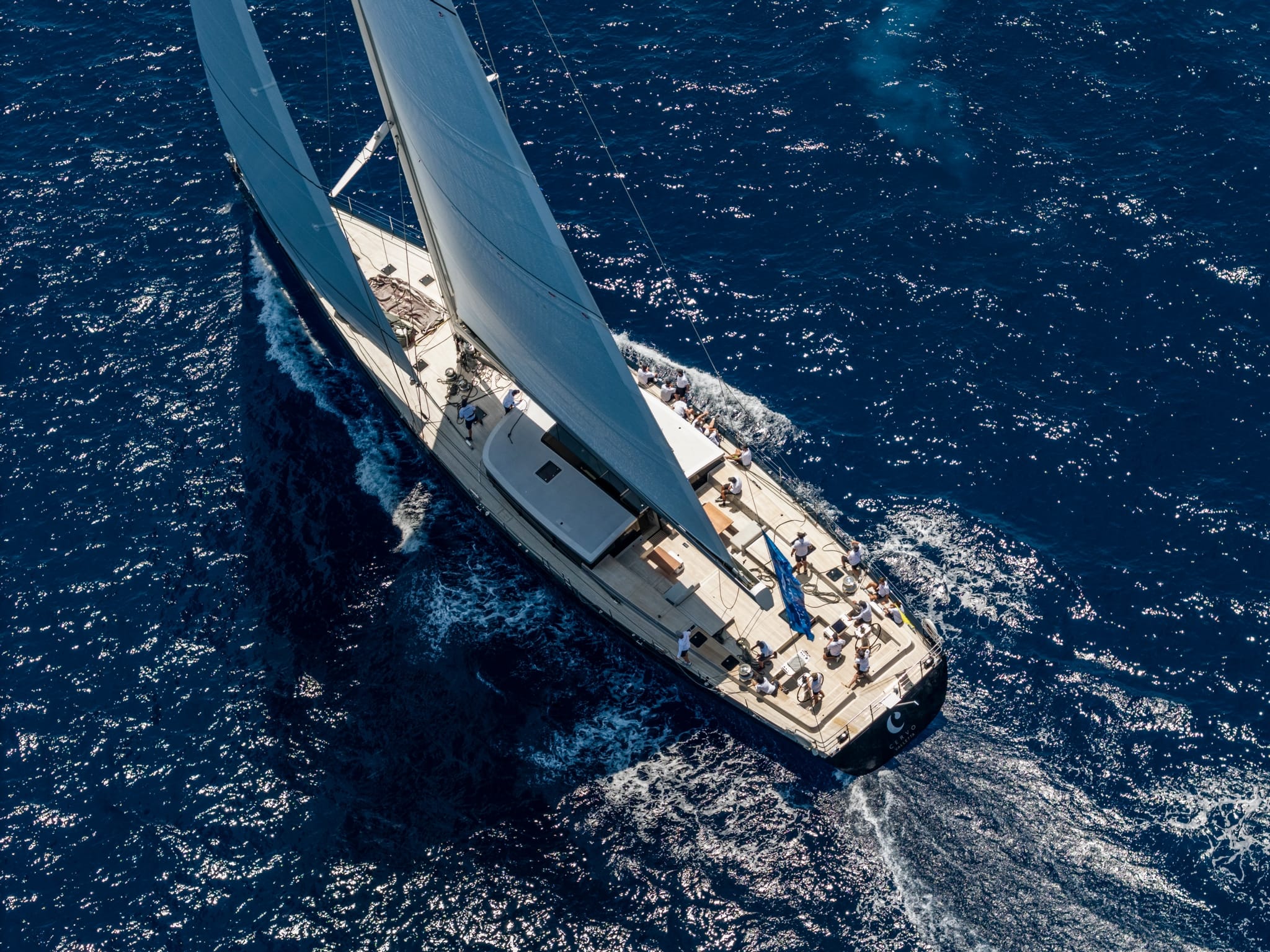 Aerial view of a sailing yacht underway